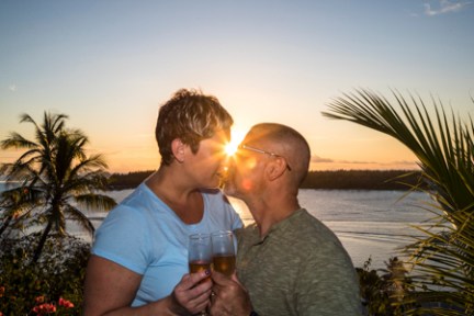 a man holding a glass of wine
