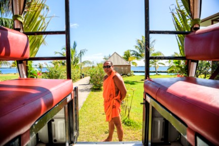 a man standing next to a train