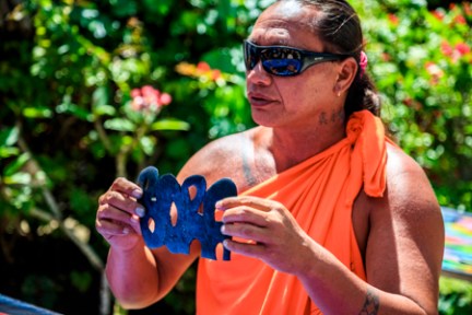 a person holding a fruit
