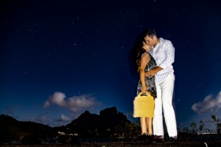 a man standing on top of a hill