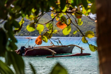 a small boat in a body of water